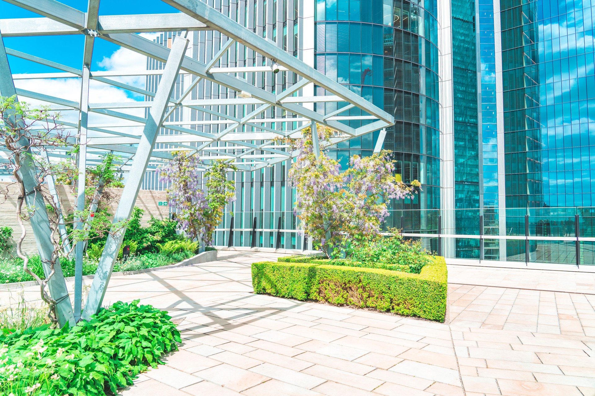 A rest stop in a park in the heart of a modern city, London